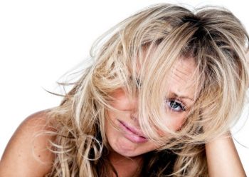 Woman with messy hair having a bad day